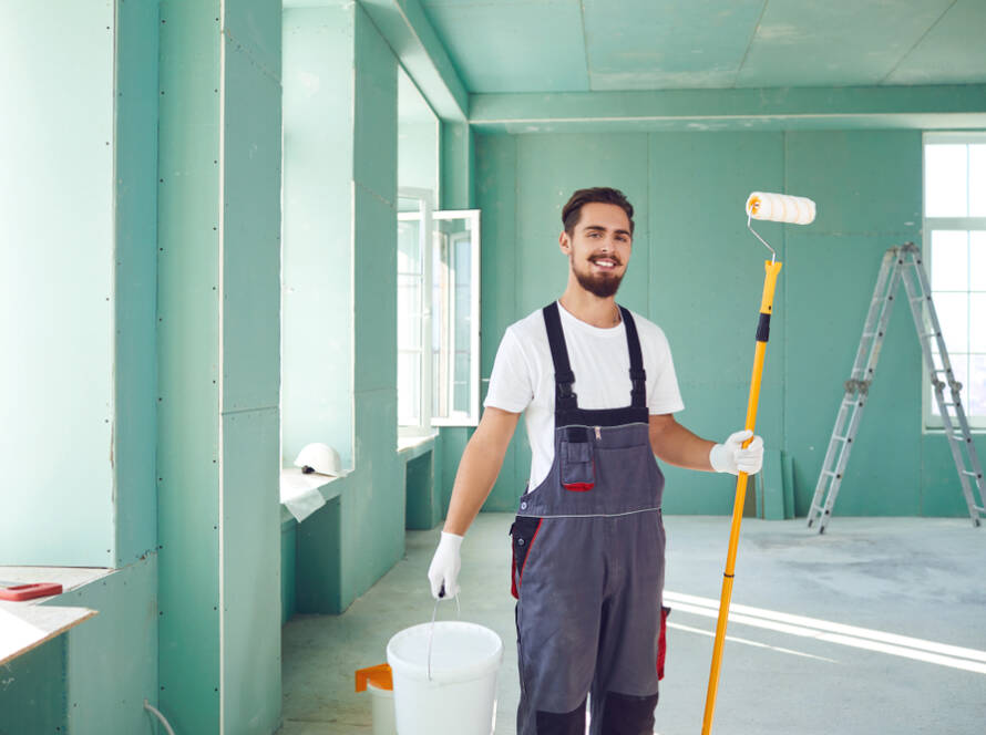 Bearded,Painter,Construction,Worker,On,A,Construction,Site.